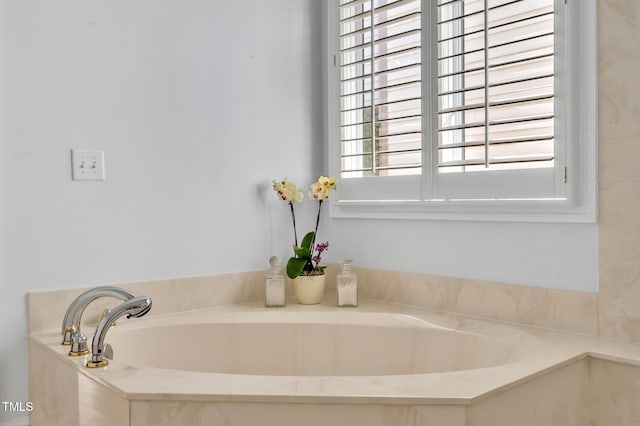 bathroom featuring a garden tub