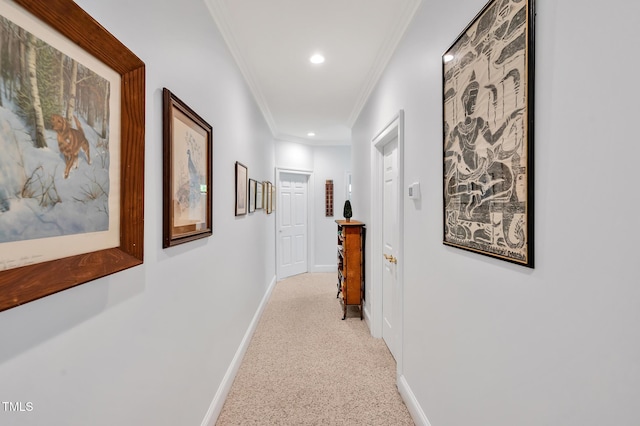 corridor with crown molding, baseboards, and recessed lighting