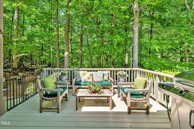 deck featuring outdoor lounge area