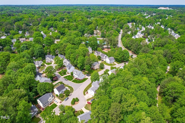 8600 Clivedon Dr, Raleigh, NC 27615 - birds eye view of property featuring a forest view