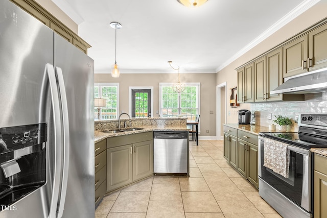 8600 Clivedon Dr, Raleigh, NC 27615 - kitchen featuring ornamental molding, under cabinet range hood, tasteful backsplash, a sink, and appliances with stainless steel finishes