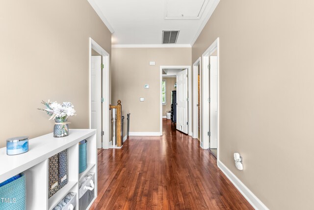 8600 Clivedon Dr, Raleigh, NC 27615 - hall featuring visible vents, ornamental molding, baseboards, and dark wood-type flooring