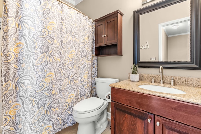 8600 Clivedon Dr, Raleigh, NC 27615 - bathroom featuring toilet, ornamental molding, and vanity