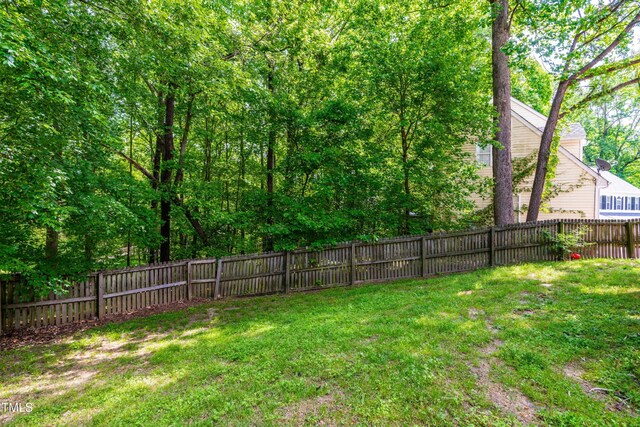 8600 Clivedon Dr, Raleigh, NC 27615 - view of yard featuring a fenced backyard