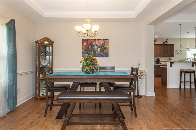 8220 Rivermist Ln, Linden, NC 28356 - dining space featuring a raised ceiling, a chandelier, and dark wood finished floors