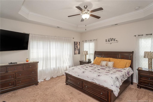 8220 Rivermist Ln, Linden, NC 28356 - bedroom featuring visible vents, light colored carpet, a raised ceiling, and ornamental molding
