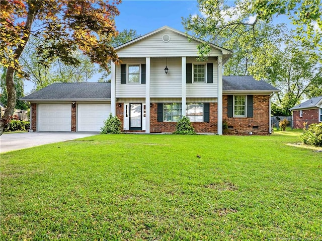view of front facade featuring a front lawn, a garage, a shingled roof, driveway, and brick siding