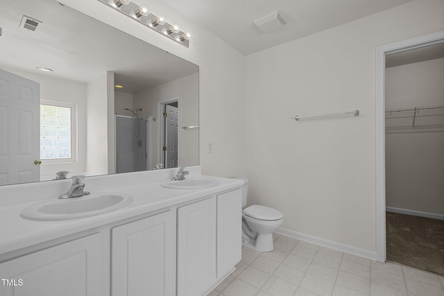 full bathroom featuring double vanity, visible vents, a sink, and a stall shower
