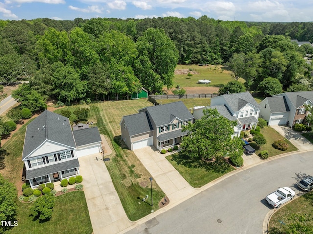 aerial view with a wooded view