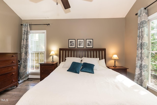 bedroom featuring dark wood finished floors and ceiling fan