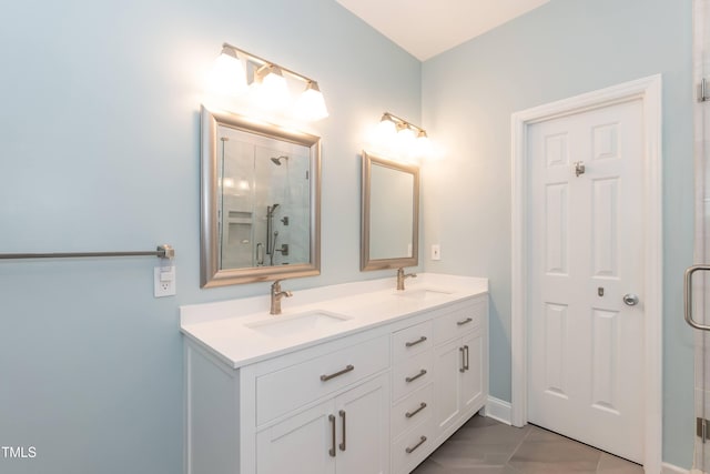 full bathroom featuring a shower stall and double vanity
