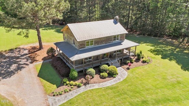 407 Howard Tant Rd, Zebulon, NC 27597 - bird's eye view featuring a wooded view