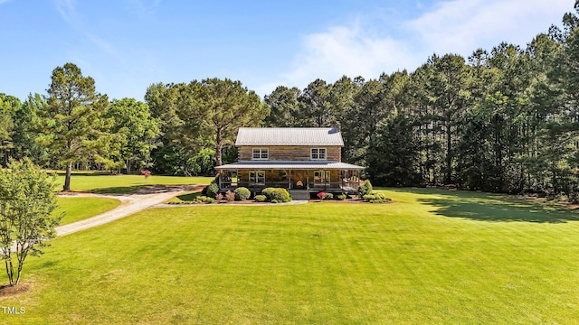 407 Howard Tant Rd, Zebulon, NC 27597 - view of front of home featuring a front lawn and metal roof