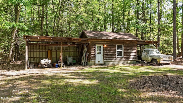 407 Howard Tant Rd, Zebulon, NC 27597 - view of pole building featuring a view of trees and a yard