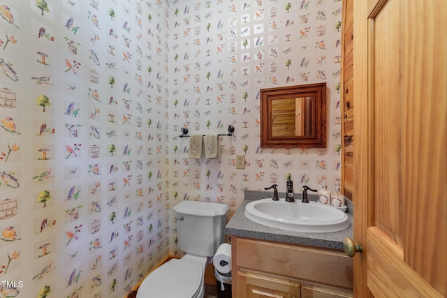 407 Howard Tant Rd, Zebulon, NC 27597 - half bath featuring vanity, toilet, and wallpapered walls