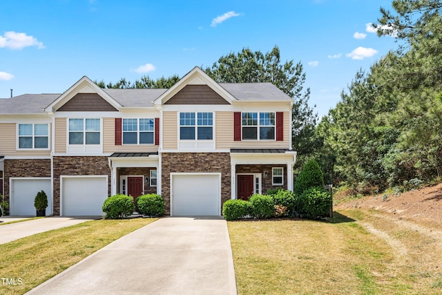 513 Commons Dr, Holly Springs, NC 27540 - townhome / multi-family property featuring an attached garage, driveway, and a front yard