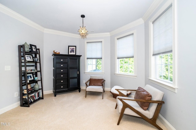 living area with plenty of natural light, ornamental molding, light carpet, and baseboards