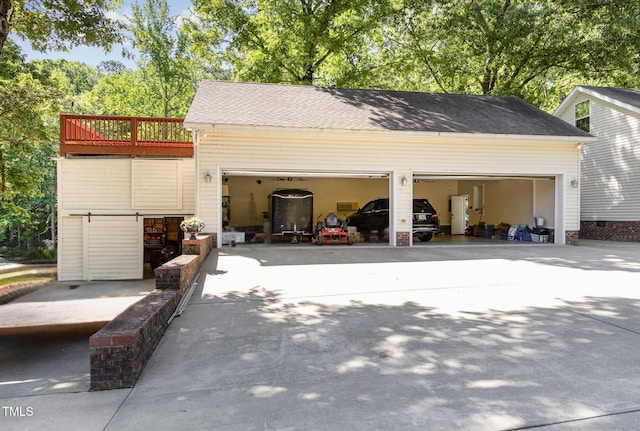 garage featuring driveway