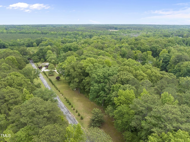 aerial view featuring a view of trees