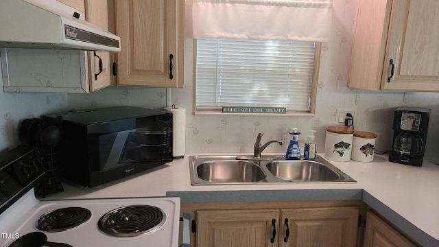 kitchen featuring a sink, light brown cabinets, electric range, and extractor fan