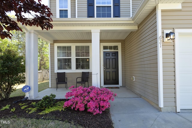 621 Childsberg Way, Hillsborough, NC 27278 - doorway to property with an attached garage and a porch