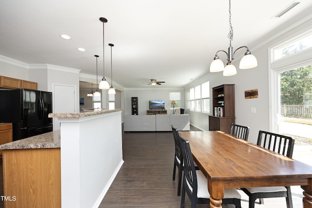 621 Childsberg Way, Hillsborough, NC 27278 - dining room with plenty of natural light, ornamental molding, ceiling fan with notable chandelier, and visible vents