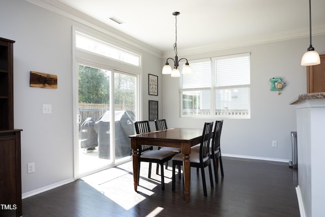 621 Childsberg Way, Hillsborough, NC 27278 - dining area with dark wood-style flooring, visible vents, baseboards, an inviting chandelier, and ornamental molding