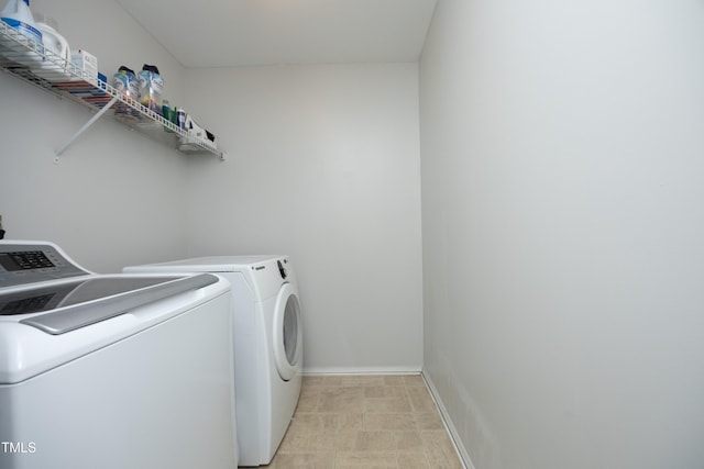 621 Childsberg Way, Hillsborough, NC 27278 - clothes washing area with laundry area, baseboards, and washing machine and dryer