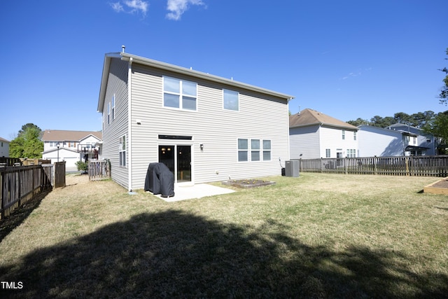 621 Childsberg Way, Hillsborough, NC 27278 - back of house featuring a lawn, a fenced backyard, a patio area, and central AC