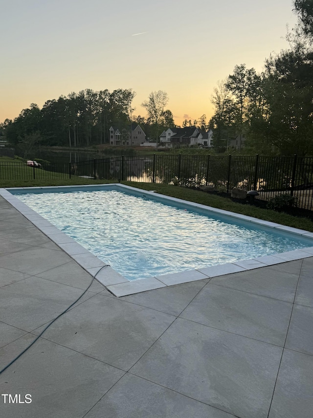 view of pool featuring a fenced in pool, a patio area, and fence