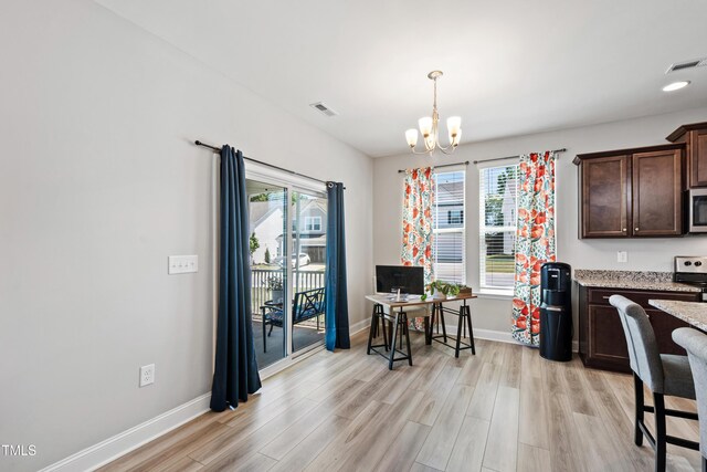 147 Antler Steel Dr, Clayton, NC 27527 - dining area with visible vents, baseboards, a notable chandelier, and light wood-type flooring