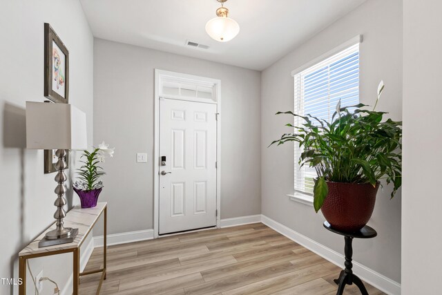 147 Antler Steel Dr, Clayton, NC 27527 - entryway featuring light wood-type flooring, baseboards, and visible vents