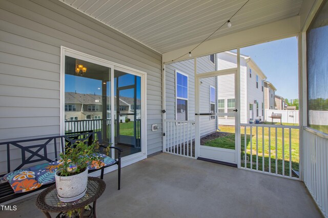 147 Antler Steel Dr, Clayton, NC 27527 - unfurnished sunroom featuring a residential view