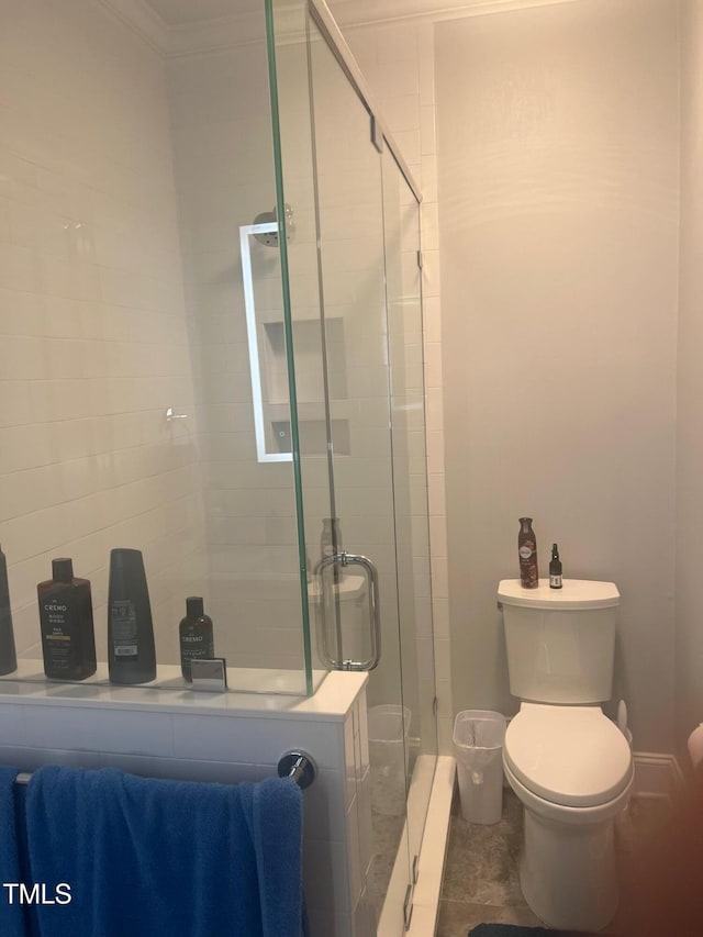 8729 Valentine Ct, Raleigh, NC 27613 - full bathroom featuring toilet, a stall shower, and ornamental molding