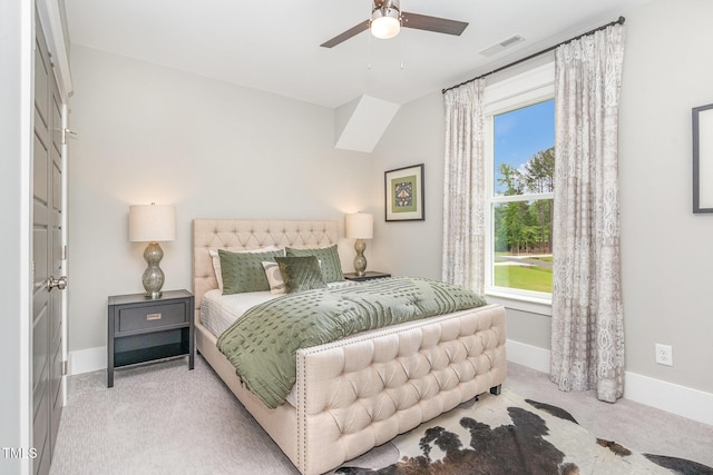 bedroom featuring visible vents, baseboards, carpet floors, and multiple windows