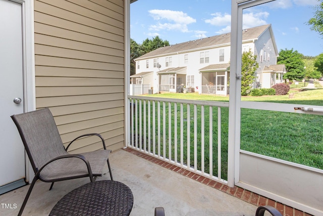 balcony featuring a residential view