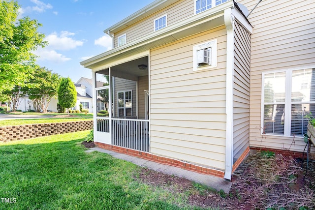 view of home's exterior featuring a yard