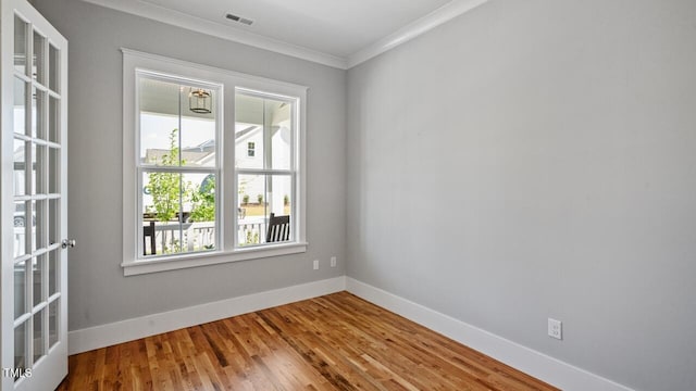 1733 Birdhaven Ln Lot 2217, Wendell, NC 27591 - spare room with crown molding and wood finished floors