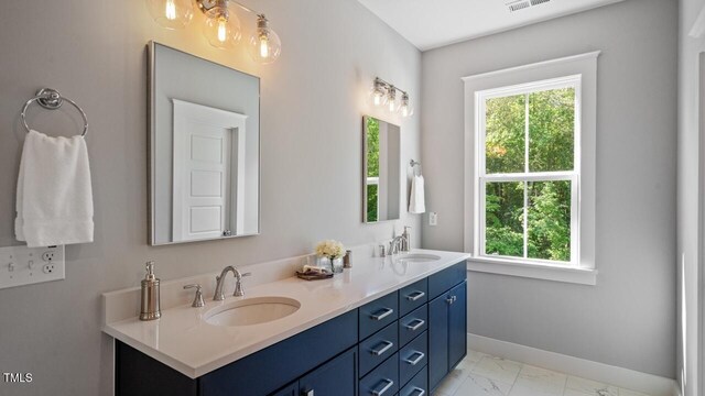 1733 Birdhaven Ln Lot 2217, Wendell, NC 27591 - full bathroom with double vanity and marble look tile flooring