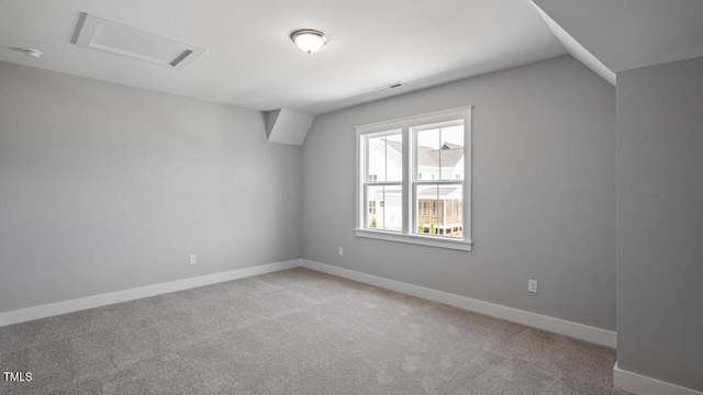 1733 Birdhaven Ln Lot 2217, Wendell, NC 27591 - carpeted empty room featuring attic access and baseboards