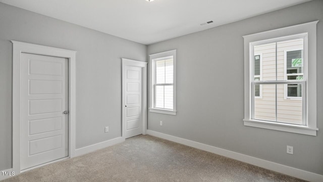 1733 Birdhaven Ln Lot 2217, Wendell, NC 27591 - unfurnished bedroom with baseboards and carpet floors