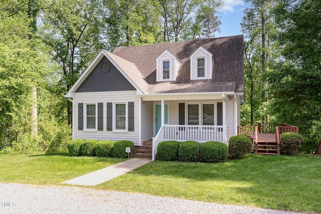 200 Weybossett Rd, Henderson, NC 27537 - new england style home with roof with shingles, a porch, and a front yard