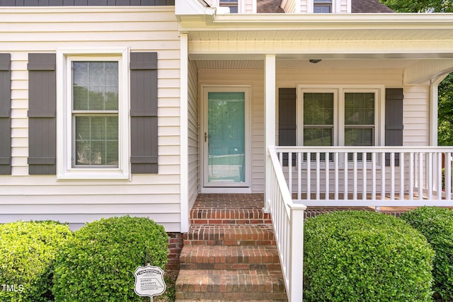 200 Weybossett Rd, Henderson, NC 27537 - view of exterior entry with a porch