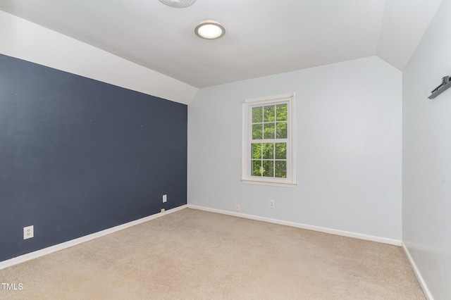 200 Weybossett Rd, Henderson, NC 27537 - empty room featuring carpet flooring, baseboards, and lofted ceiling