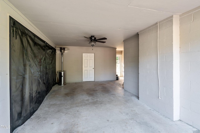 view of patio featuring ceiling fan