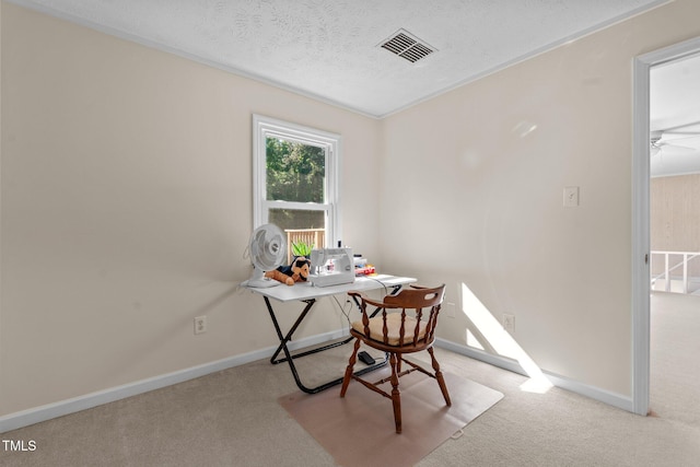 office area with baseboards, carpet flooring, visible vents, and a textured ceiling