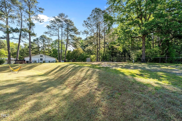 view of yard with fence