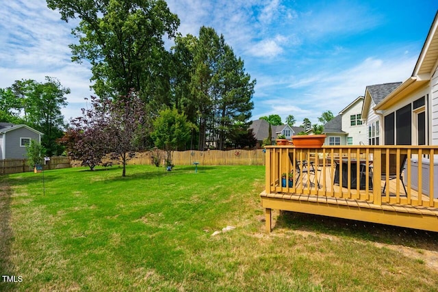 view of yard featuring a deck