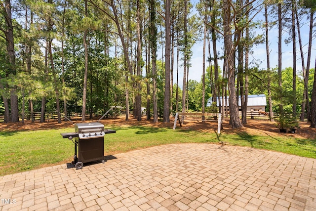 108 Cedarwood Dr, Louisburg, NC 27549 - view of patio featuring area for grilling and view of wooded area