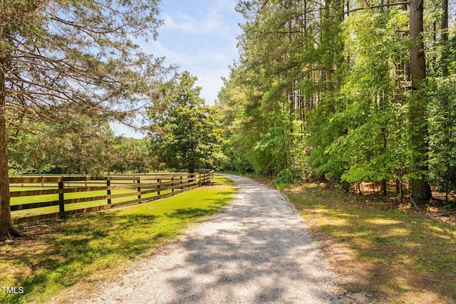 108 Cedarwood Dr, Louisburg, NC 27549 - view of road with a forest view